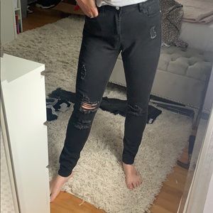 Black distressed skinny jeans